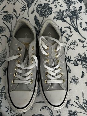 Converse Low-Top Sneakers in Light Blue with white polka dots.